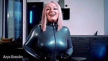 Fat and curvy MILF in latex fetish dress teases with her natural boobs