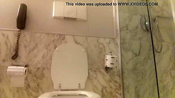 Big boobed amateur girl shows off her peeing skills