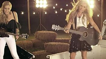 Teen in denim jeans rides cowgirl style in country music video
