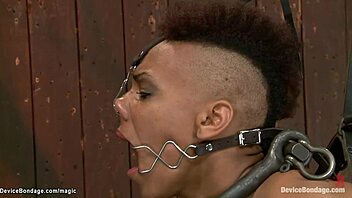 Kinky lesbian slave gets her ass whipped and fucked