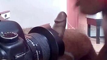 Dark-skinned African teen gives a sloppy blowjob