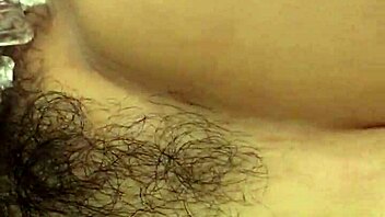 Asian teen moans with pleasure while using sex toy