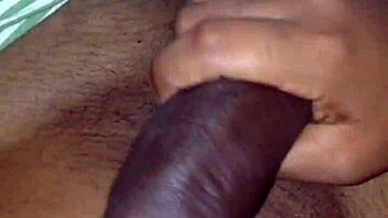 Close-up of her big dick in my mouth