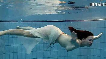 Softcore European teen gets wet and wild in the pool