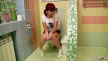 Young and horny lesbians explore their desires with toys in the bathtub