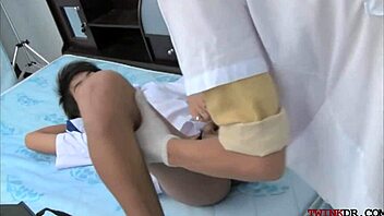 Skinny Asian twink gets his ass fingered and fucked by doctor in hospital setting