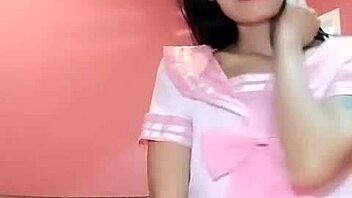 Small boobs Thai girl fingers herself to orgasm