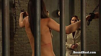 Lesbian domination and submissive training with bondage and whipping