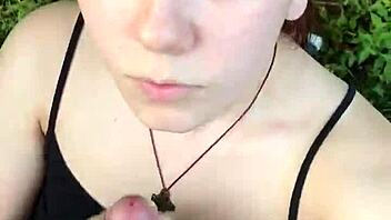 Amateur girlfriend sucks cock in the great outdoors