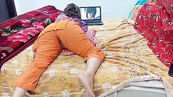 Arab college girl experiences intense orgasm while watching porn on laptop