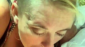 Amateur BBW gives a handjob and swallows cum in public