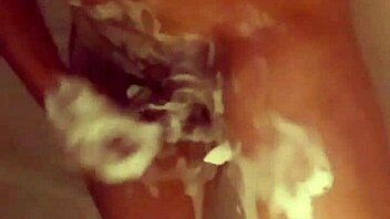 Hidden camera captures amateur gay's shower masturbation