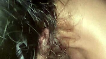 Mamasita's big tits and natural clit are on full display in this erotic video