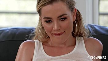Blonde bombshell with big natural boobs fingers herself in high heels