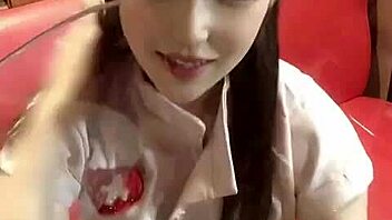 Experience the pleasure of an Asian girl's kiss in asmr doll outfit