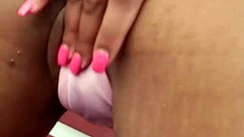 Amateur black girl masturbates on cell phone
