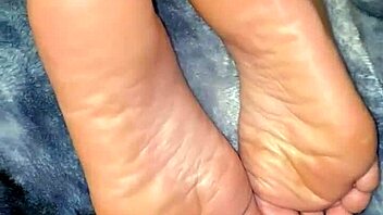 Hidden Latina slut gets her feet covered in cum