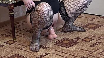 Amateur brunette in stockings fucks herself with a dildo and blows a toy out of her wet pussy