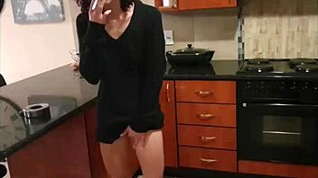 Amateur MILF smokes a cigarette while enjoying her pissing fetish