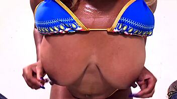 Natural tits and big ass get oiled up in a steamy video