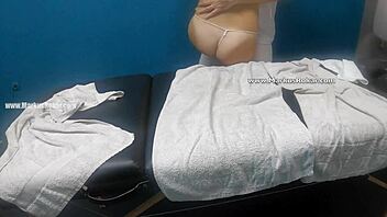 Voyeuristic massage turns into a sensual rubdown for a blonde teen