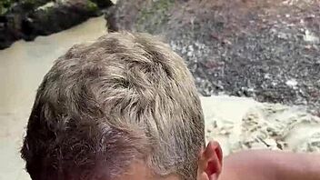 Amateur gay couple gets kinky on the beach with anal and big cock