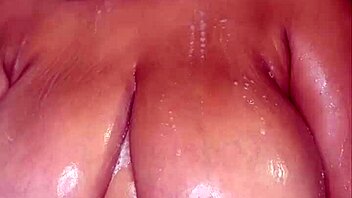 Busty amateur Tatiana enjoys a shower