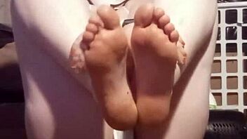 Hot blonde pornstar shows off her bare feet