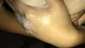 Masturbating in the shower with a big natural tits girl
