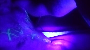 Home alone fun with a big blacklight and his solo masturbation