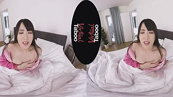 I watch this Asian brunette masturbate in her pyjamas.