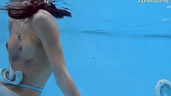 Erotic video of a petite brunette teasing in the shower