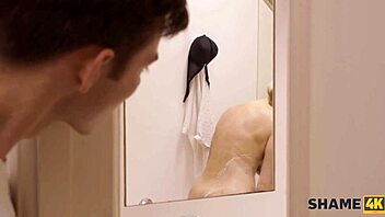 Bathing beauty with big natural tits gets dirty in a steamy shower scene