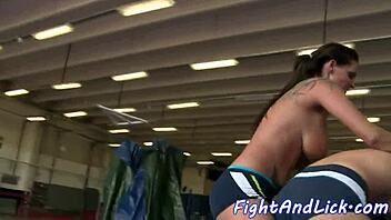 Big boobed girls settle their differences in a lesbian wrestling match