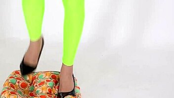 beautiful woman in high heels stepping on cushion