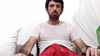 Massive cock bulging through sheer red lace underwear