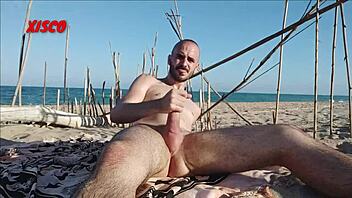 i'm jerking off right here on the beach