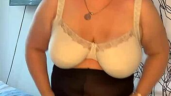 European MILF shows off her big boobs and natural tits