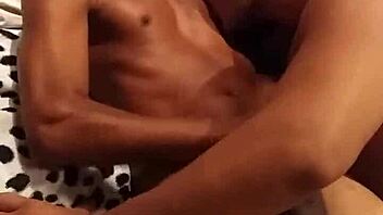 I can't believe how big Guto's cock is, and that well-endowed black guy is fucking me bareback in the nude.