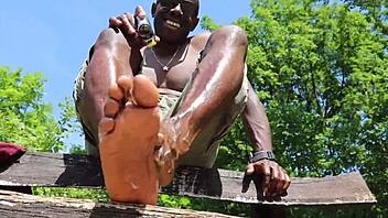 close up of black foot for feet fetish fan request