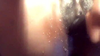 ebony babe in a water play scene with toys