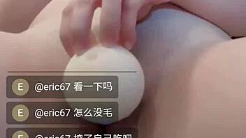 Taiwanese webcam girl licks dildo for wild satisfaction on SWAG Live