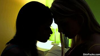 Skin Diamond dives into her brunette lover's wet pussy with passion.