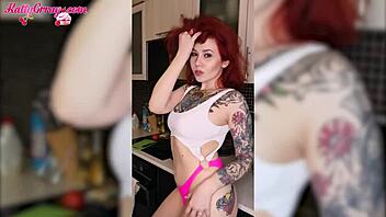 a sexy teen girl in cute lingerie fingers her pussy in the kitchen solo