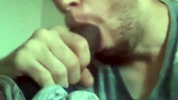 Bareback gay lover takes a huge black cock in his mouth