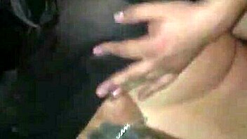 A mature wife enjoys group sex at a swingers club
