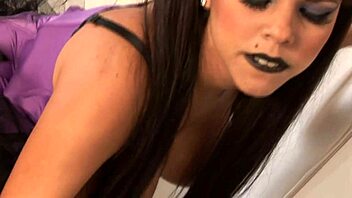 Diamond Decides To Show Off Her Amazing Curves In A Purple Corset