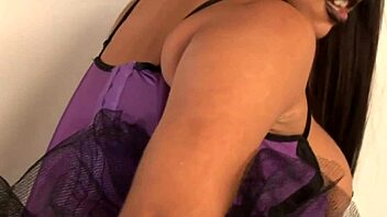 Diamond Decides To Show Off Her Amazing Curves In A Purple Corset