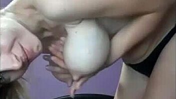 Her big tits steal the show in a steamy bedroom solo. Watch her tease in panties and play with her nipples.