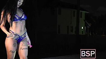 Mandy Sin teases in pool striptease before using dildo on ass